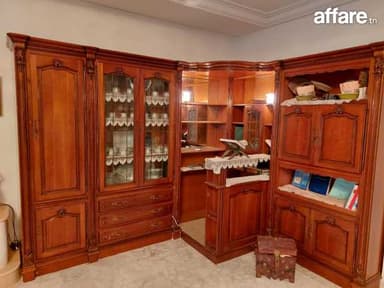  Le meuble en coin en merisier bois noble 