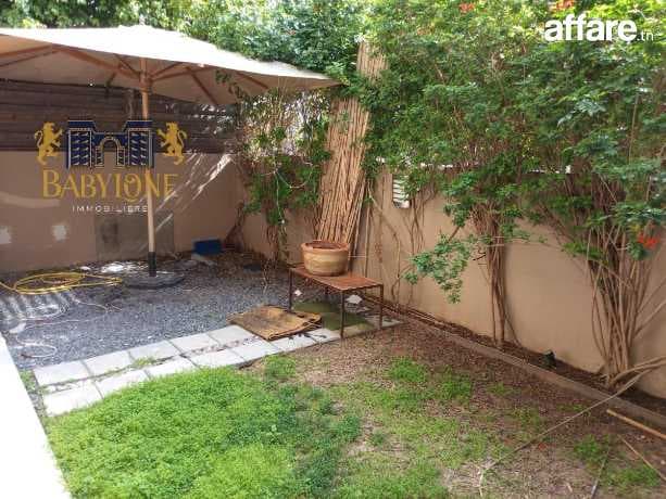 A louer un appartement en s1 avec jardin à la Marsa 
