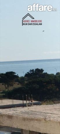 maison style américain près de la mer