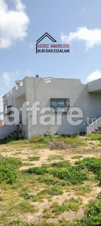 Terrain agricole contenant une villa