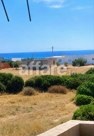 Maison R1 près de la mer