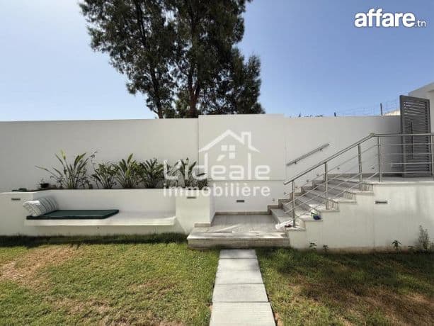 une maison moderne avec jardin location à l'année