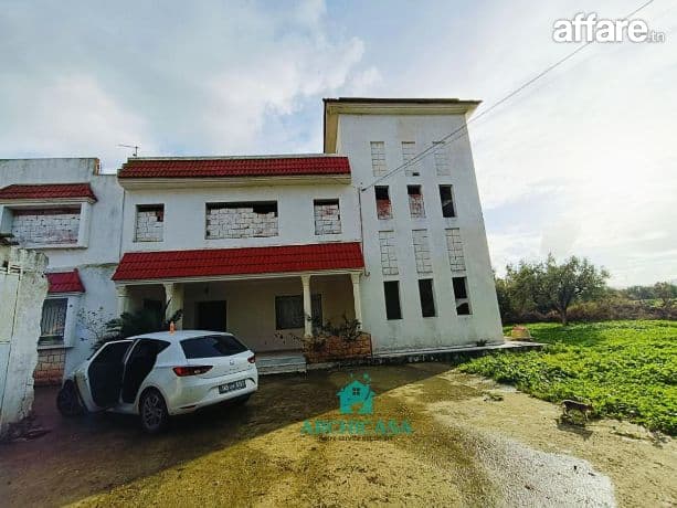 Une ferme à sliman avec villa à vendre