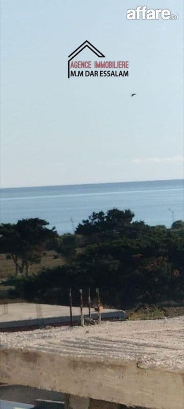 maison style américain près de la mer