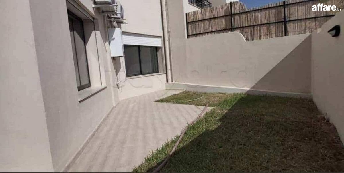 ENNASR 2 – Élégant Appartement S+2 avec Jardin Privatif
