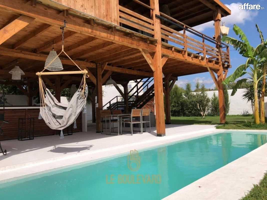 A Vendre Maison En Bois S+4 Avec Piscine Situé à Bouargoub