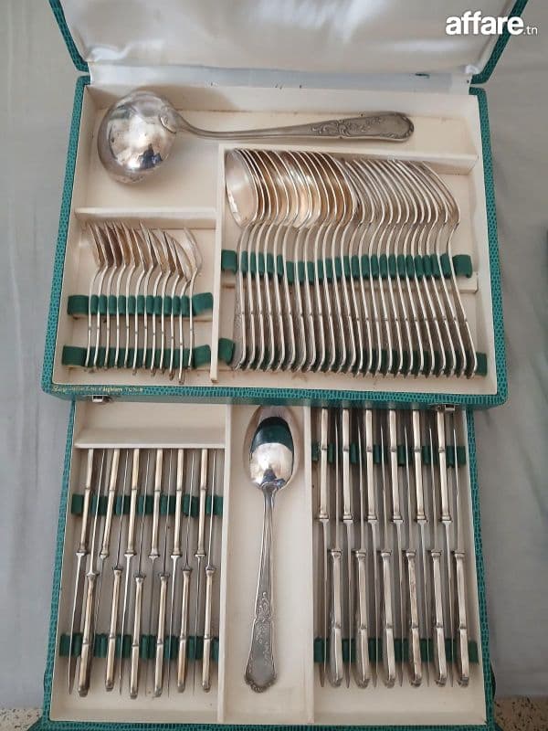 Ménagère en argent 75 pièces