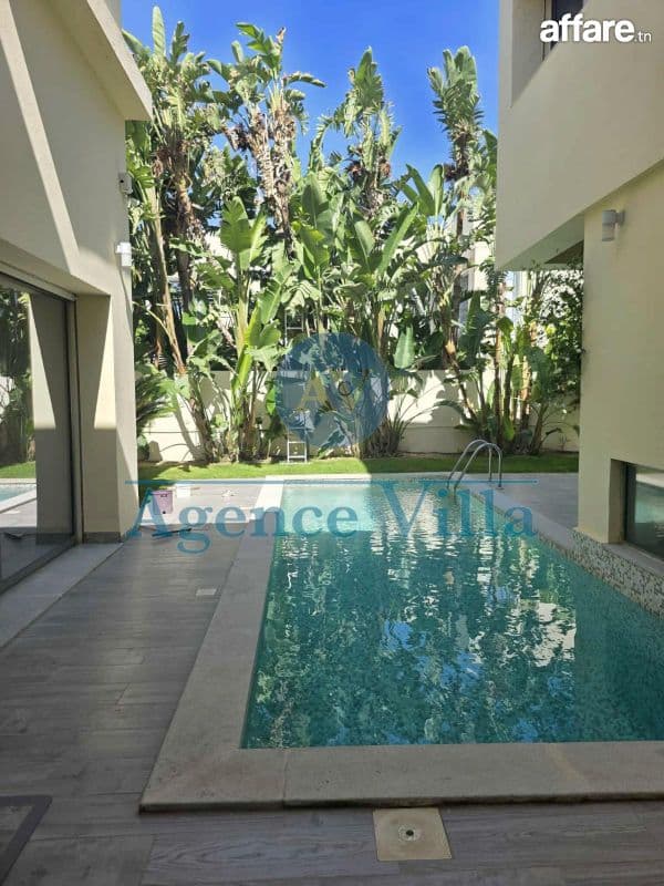 une villa aux jardins de carthage avec piscine